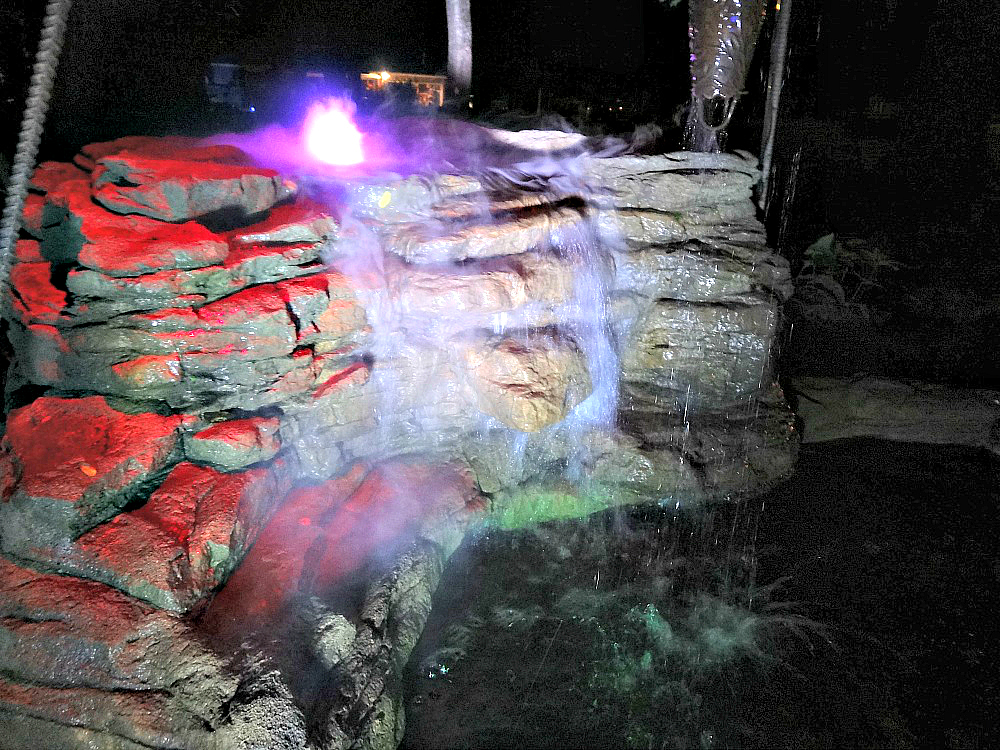 Cool rock waterfall formations with fog and LED lights